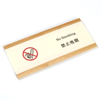Настенная табличка с предупреждением о запрете курения